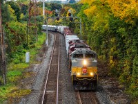 One Way Railroad
When it turns out well for me, I do enjoy watching the one way logistics of CP 422. When Toronto Yard handed its outbound 421s some disappointing leaders in the past, that was the end of story. Now, trailing units are a key piece of information to pay attention to as unusually large consists hint that Sudbury demands another powerset for their lone manifest origin. No northbound counterpart exists, and so 421 is deemed the delivery boy for Sudbury power. On the first week of October, 421-05 was the delivery boy for two good trains; 8BAL that later continued northwest with 3747 and 9022, and this 422, with 7016 and 8745. Here it is seen on its returning trip on the North Toronto at the Summerhill signal bridge in Rosedale, Toronto. Fall colors were booming elsewhere in the province, but the carbon emissions from locomotive exhaust seem to keep the trackside foliage here a little too healthy.