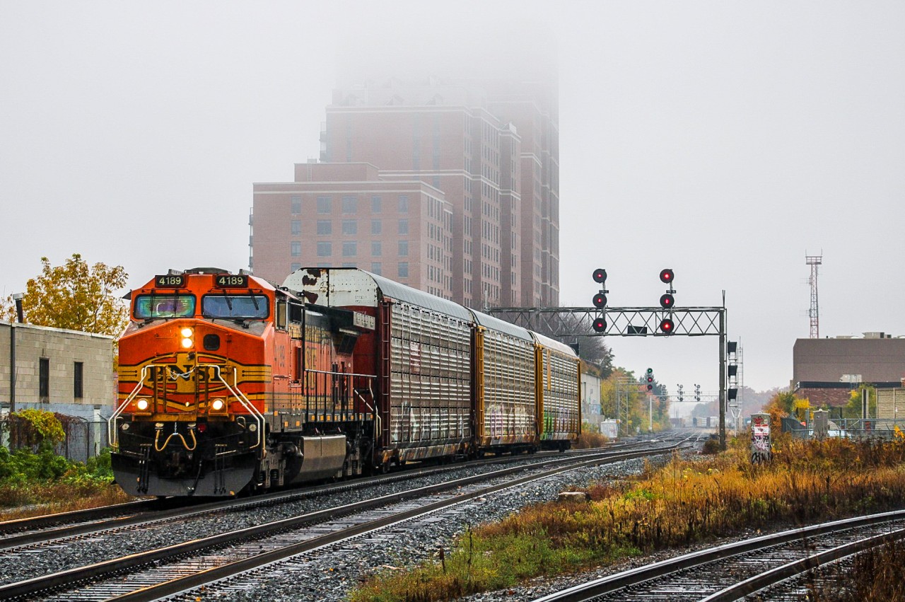 Halloween vibes were trackside in Toronto today with railfan trick or treating. Tricky rainstorm conditions yet a treat to a pumpkin H2 leading 234. The fog almost did the favor of removing the apartments from this view at Osler Street whilst BNSF 4189 knocks down the West Toronto Signals, but their ghostly presence remains.