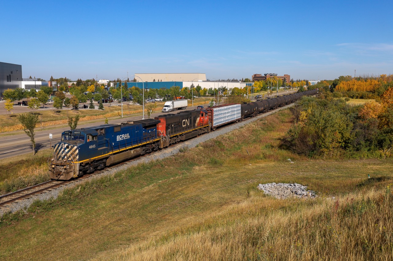 It's not quite Northern Alberta Railway Geeps on the final approach to Dunvegan Yard, but a BC Rail GE will do just fine. The daily southbound from the Peace River region of Alberta arrives into the Capital city with BCOL 4645 and CN 5720.
