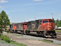 One of CN's many 100 series intermodal trains starts to pull out of Capreol, Ontario after a crew change.  Power for the train is CN 5787 IC 1008 and CN 2870.