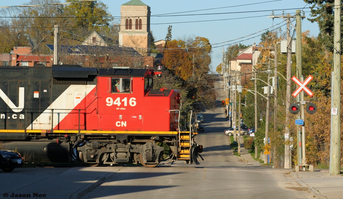 CN L568 with GP40-2L(W)’s 9416 and 9639 are seen approaching Madison Avenue on the Huron Park Spur in Kitchener as they head to the interchange with Canadian Pacific.
