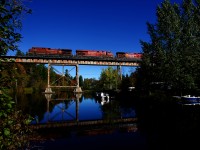CP 223 has a trio of GEs as it crosses the Eastman trestle with a long train.