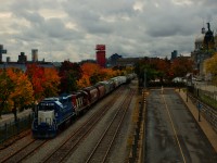 CN 500 is inbound into the Port of Montreal with a decent sized train as it passes some nice fall colours. At right are two Old Montreal landmarks: the Bonsecours Market and the Notre-Dame-de-Bon-Secours Chapel.