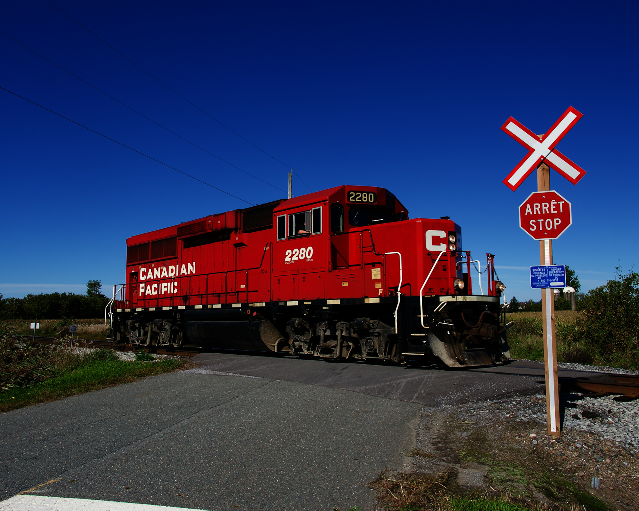 Since CP's takeover of the old CMQ, the line to Newport, Vermont has been deemphasized, with only local traffic moving that way and bridge traffic going via the D&H. For a little while CP was running a turn from Newport to Farnham 2-3 times a week, but now CP has no crews based out of newport. Instead, a Farnham crew runs once a week to Richford to leave cars, I believe a Vermont Railway crew meets them there to interchange cars. Here CP G24 has just left Farnham Yard and is off to Richford with CP 2280 and no cars.