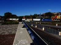 CN 4135 & CN 4904 is the power as the Pointe St-Charles Switcher heads towards the Port of Montreal. At left is a park that lets you see the rail action around here.