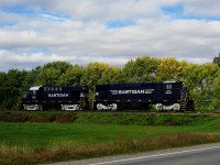 After dropping off one car at Saint-Lambert-de-Lauzon, the Sartigan Railway's spotless M420W & RS-18 are heading light power to Scott to tie up for the day.