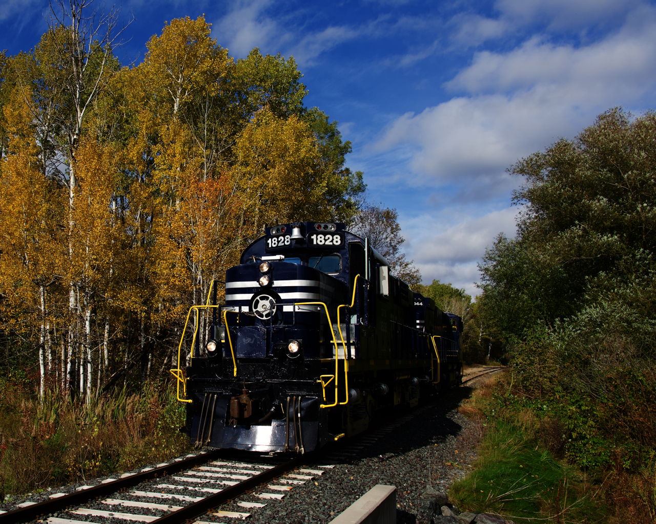 After wyeing their power after the run back from Joffre, the Sartigan Railway is heading back to their home base of Scott to tie up. CFS 1828 was originally built as CP 8793 in 1958. It was chop nosed and rebuilt as CP 1828 in 1985.