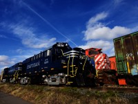 CFS 1828 & CFS 2044 are at rest at Scott a few minutes after arriving from a run to Joffre and back. Barely visible at far left is what will soon be an enclosed shops to park a couple of units. At right is another M420W which is used as a parts source I believe.
