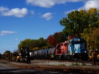 After stopping at Dorion for a lunch break, CP G95 with CMQ 3817 & CP 3108 is about to head east with ten cars. It will head to Lachine to work at Lachine IMS Yard and the Coca-Cola plant.