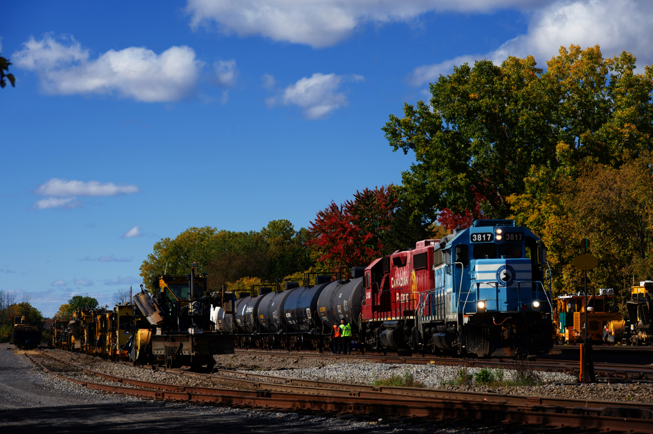 After stopping at Dorion for a lunch break, CP G95 with CMQ 3817 & CP 3108 is about to head east with ten cars. It will head to Lachine to work at Lachine IMS Yard and the Coca-Cola plant.