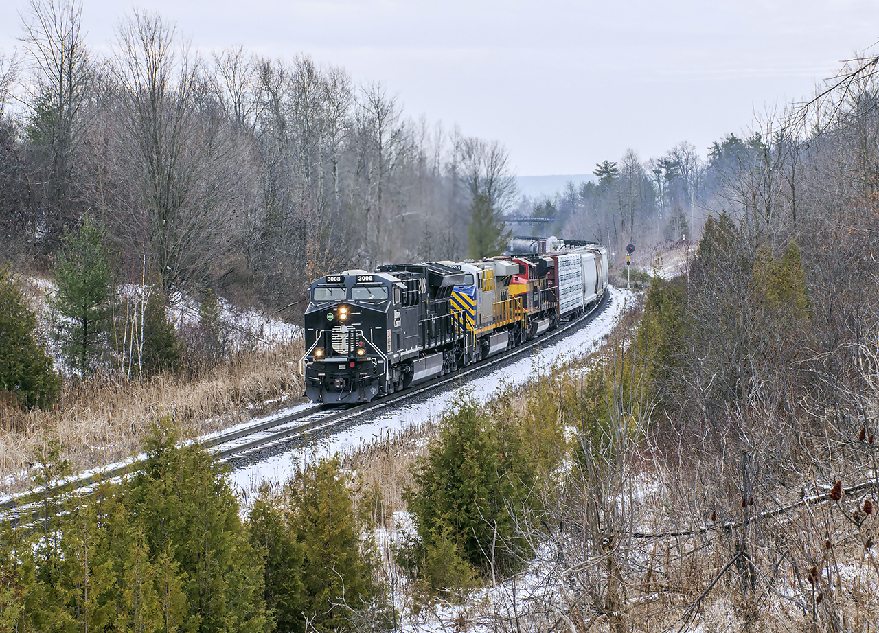 Near the end of 2021, a consist bringing out a number of the foamers was that of CN 3008, CREX 3934, KCS 4126 heading up M302.  Nearing it's destination of Toronto, the train is seen making it's trek upgrade by mile 30.