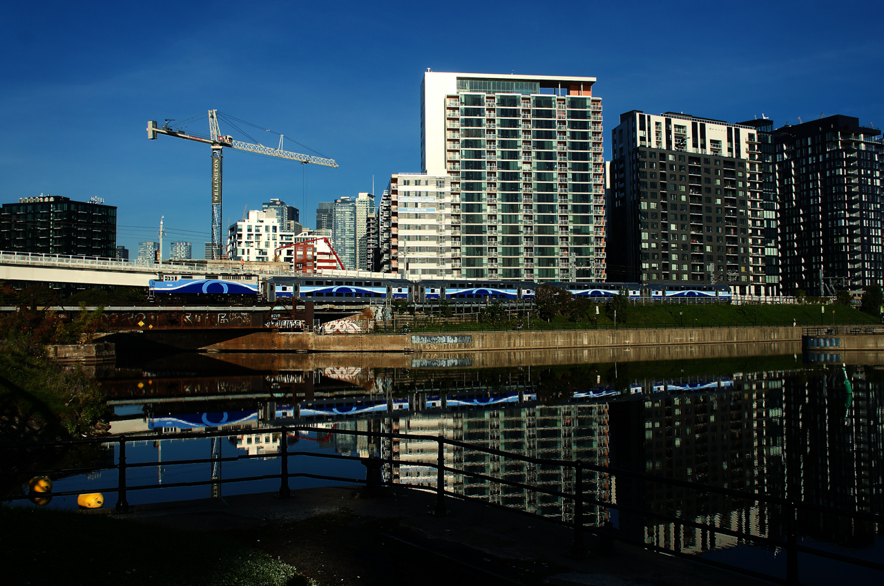 Trains on the Mont-Saint-Hilaire line were 100% powered by dual mode ALP-45DP locomotives for numerous years, but during the last year or two F59PH locomotives have been used here and there. Here class leader AMT 1340 pushes the last run of the day from Mont-Saint-Hilaire past the Peel Basin.