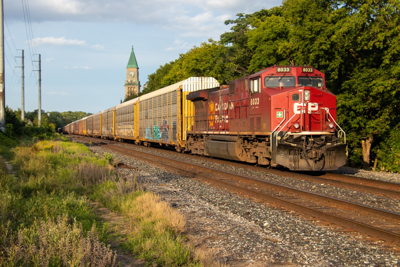 CP 8033 pushes the tail end of CP 112 down the hill on the North Toronto. The star of this scene is the historic CP North Toronto clock tower which stands atop the old North Toronto station (now an LCBO). If I remember correctly, the last passengers the station saw were veterans returning from World War II in Europe.
CP 8033 is also a part of an inside joke amongst some friends to it was cool to see.