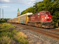 CP 8033 pushes the tail end of CP 112 down the hill on the North Toronto. The star of this scene is the historic CP North Toronto clock tower which stands atop the old North Toronto station (now an LCBO). If I remember correctly, the last passengers the station saw were veterans returning from World War II in Europe.
CP 8033 is also a part of an inside joke amongst some friends to it was cool to see. 