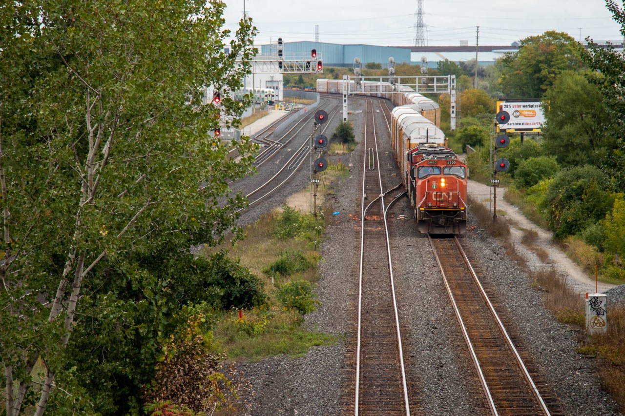 CN L517 crawls out of the CN Oshawa yard and onto the Kingston sub with CN SD70I class leader (CN 5600) leading a DC Gevo (2233) and a GP40-2WL (9639), along with over 100 cars of autoracks and general manifest. The searchlights at Mile 304 of the Kingston sub are the last ones in the area, with the CN Pickering Jct ones not shootable and the other nearest absolute signal searchlights being Mile 278 (Clarke). In 2021, CN Liverpool (Mile 311) was replaced with LEDs as well. With CN actively replacing searchlights all across the system, I can't imagine these sticking around for years and years to come. I hope I am wrong...