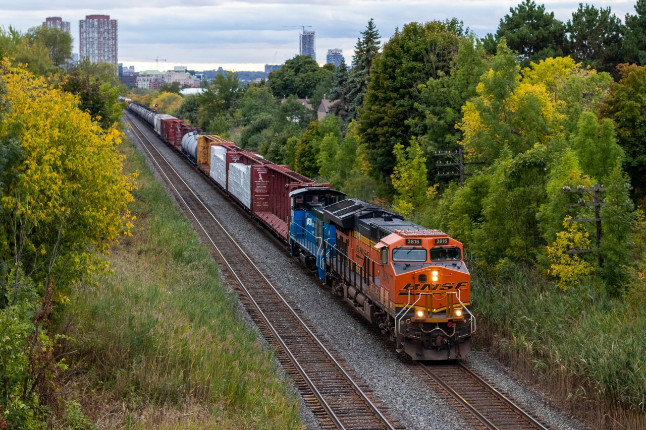 Ok this was an odd one. CP "Extra Roadswitcher" BNSF 3816 East crawls up the hill on approach to Toronto yard with the aforementioned BNSF Gevo, GMTX 333, and 75ish cars. The crew stated that they were going "transfer speed" (15mph) for reasons unknown to me, but it allowed me enough time to get trackside and set up for this strange train. The crew was likely operating under either H19 or H25 but they only ever labeled themselves as an extra roadswitcher. GMTX 333 was pulled from Streetsville earlier that day. This train brought it from Lambton to Agincourt before CP 131 took it away from Ontario.