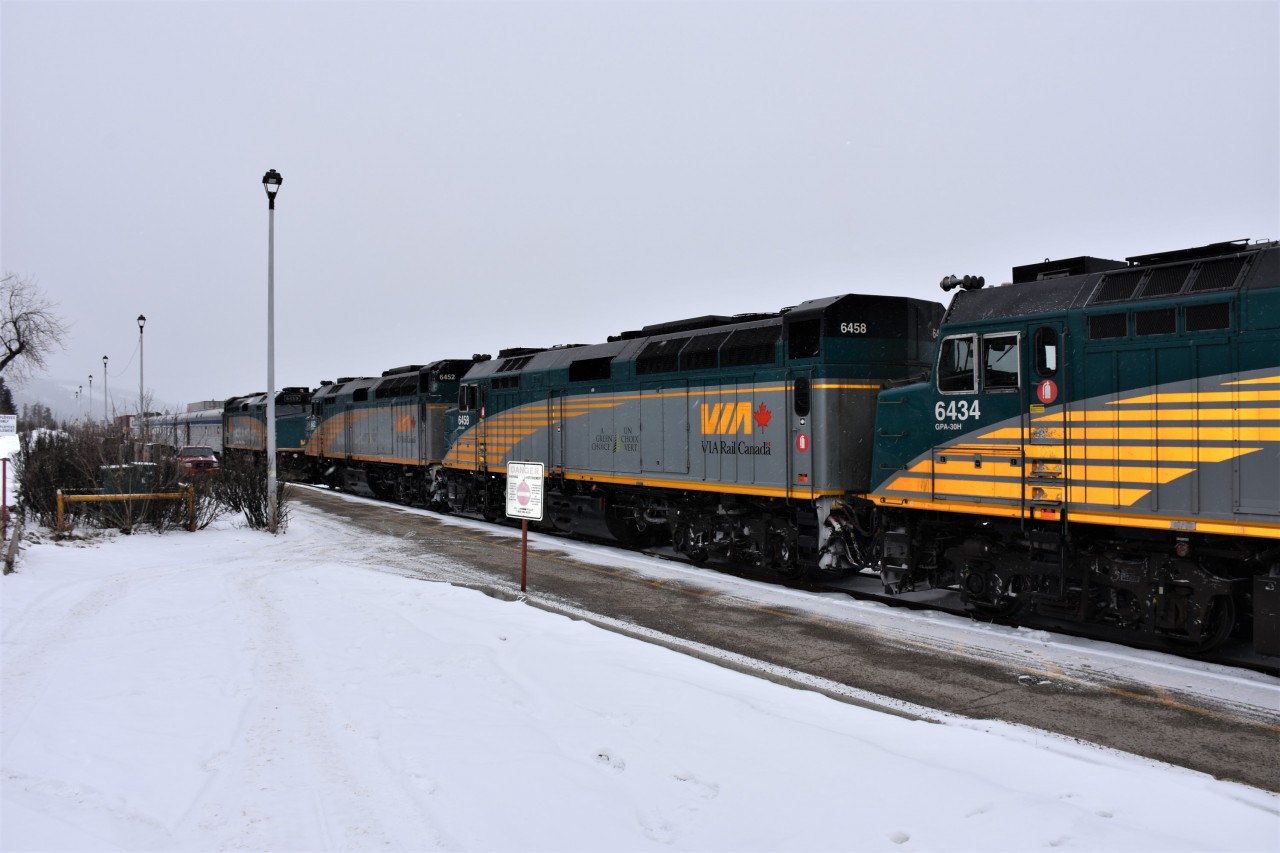 VIA #2 The Canadian and VIA #5 The Skeena sit nose to nose at Jasper, AB on this cold, damp, windy, and lightly snowing March 7, 2020.
The Canadian is making its regularly scheduled stop for all on-board services, head-end crew change, fuel, and dome car window washes, while The Skeena is made ready for its journey to Prince Rupert, BC.
No. 2 would make it into Toronto several days later right on schedule, and only a few days before the initial round of Covid restrictions and cancellations began to fall into place. It would be a full 21 months from this date before I would be able to ride the Canadian again.