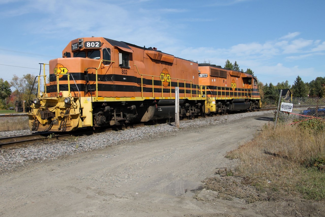 Huron Central Railway 802 and 3802 are sitting on the east leg of the wye connection to the Little Current Spur at McKerrow.