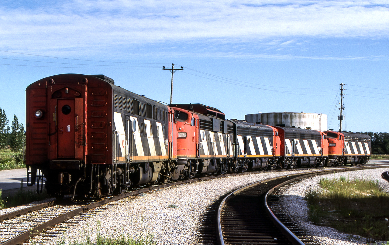 CN 9166 heads up a line of five stored CN F-units in Toronto on August 5, 1987.