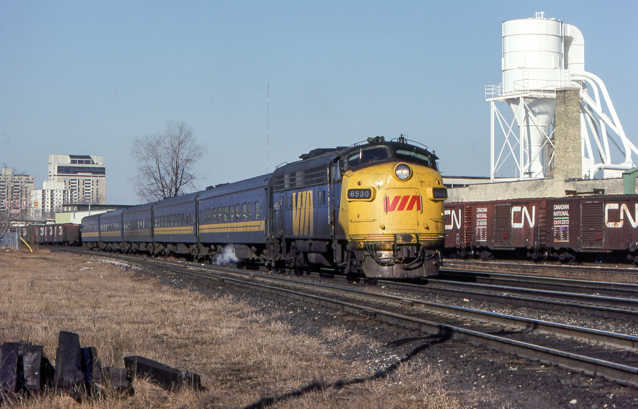 VIA 6530 is eastbound in London, Ontario on March 24, 1981.