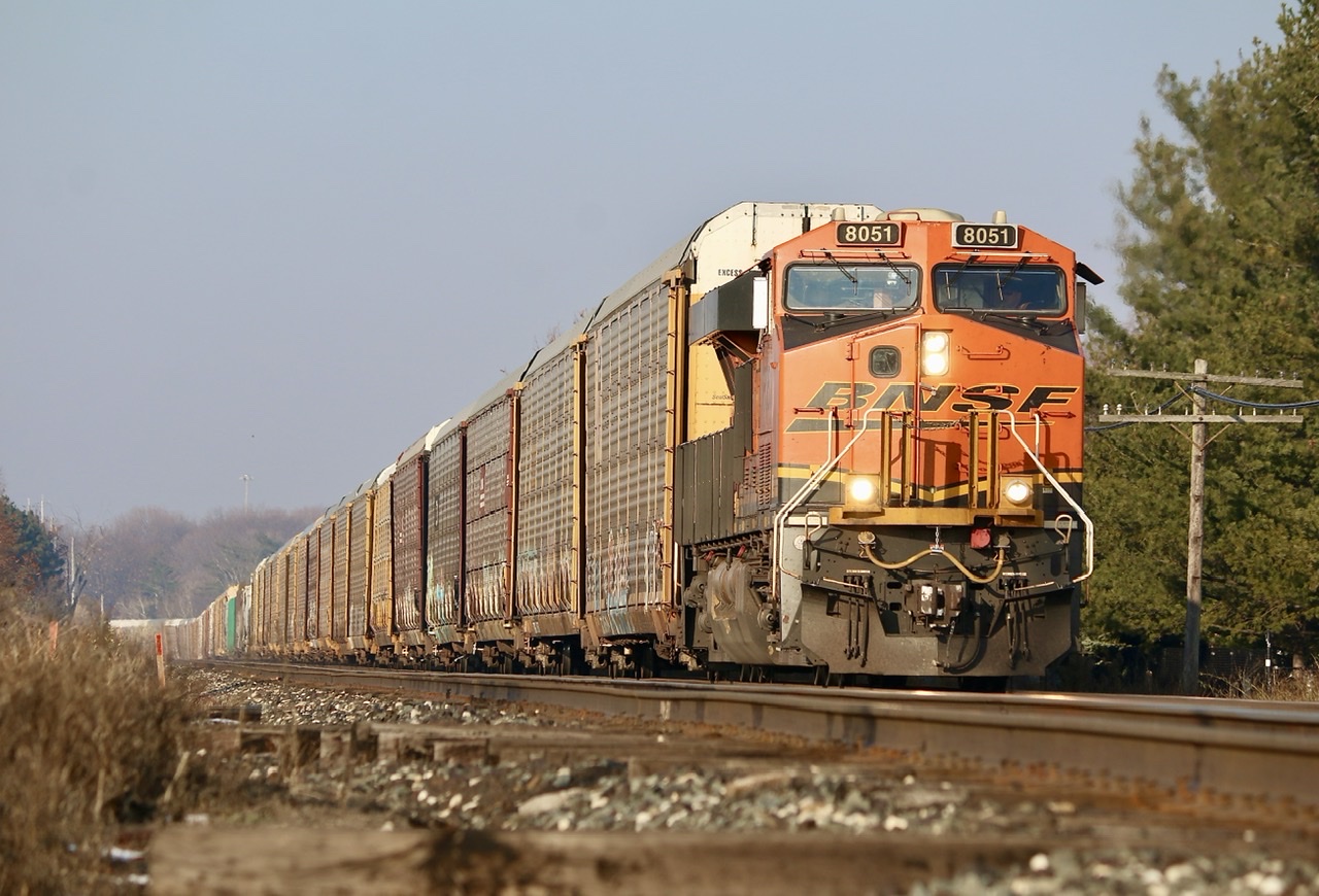 Borrowed BNSF 8051 with a decent size train makes good time as it heads Toronto bound on a nice late fall day.