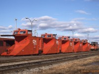  Looking out the window here in Welland at at least a foot of snow today (Nov 19th 2022) We sure would love to see some of these out on the tracks.  Five CN Plows 55209-55267-55400-55241-55xxx and a van await some snow at Gordon Yard in Moncton NB on Jan 22nd 1996. 