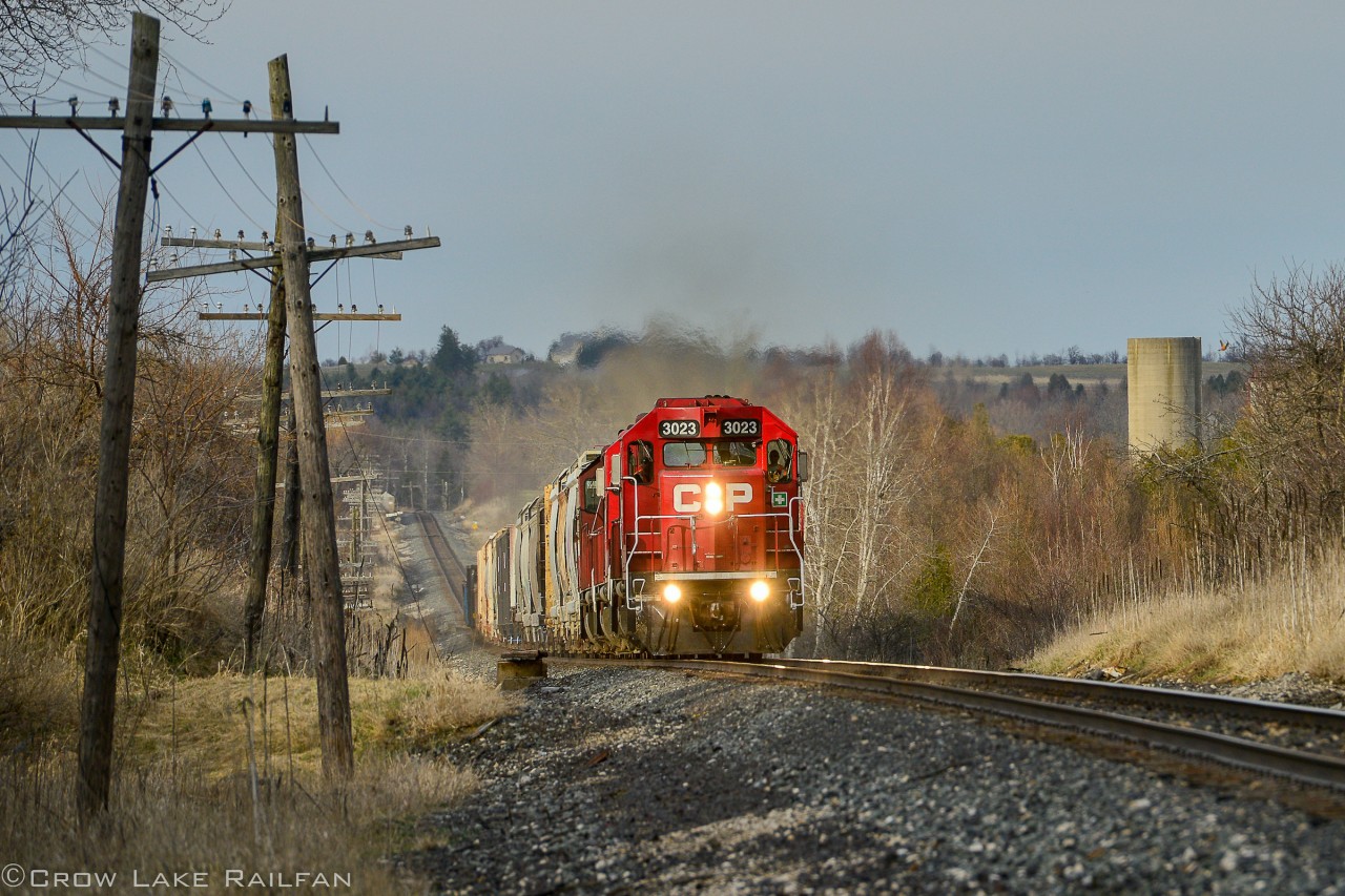 A brief opening in the clouds was appreciated as a local notches up the hill as it returns from servicing Guelph Junction. Nothing says old school railroading like geeps running at mainline speeds.