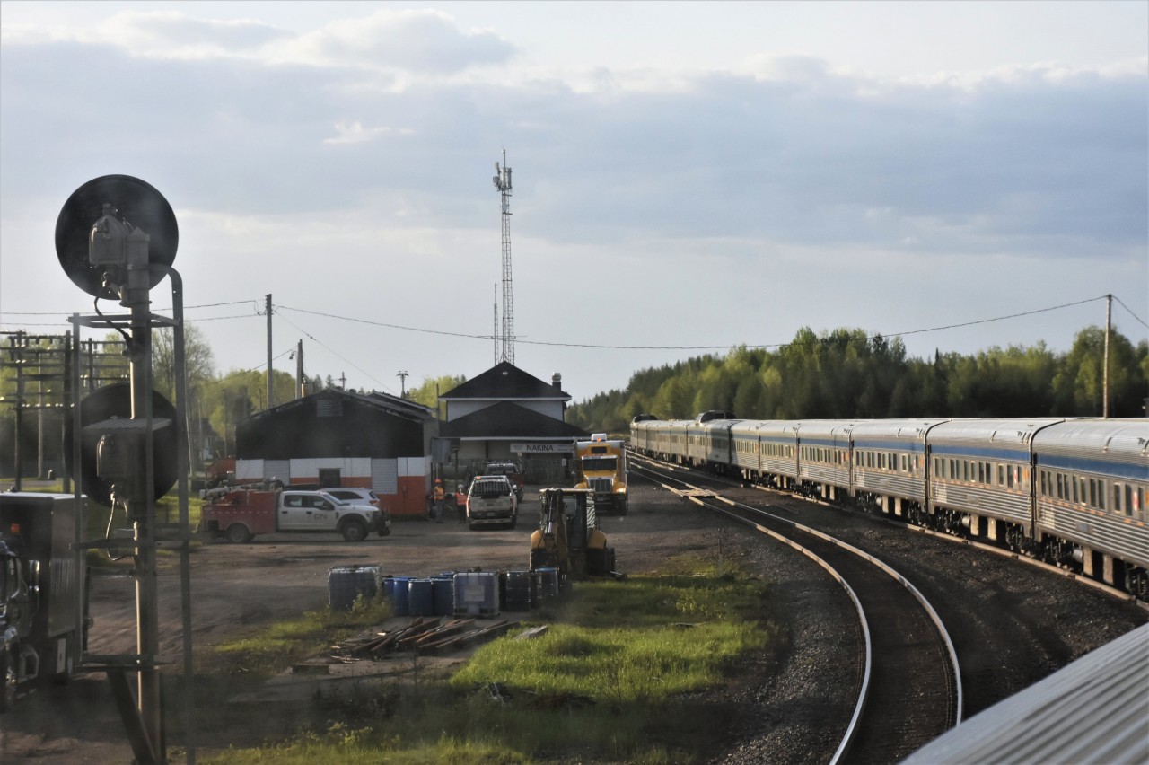 It's 07:00, the meet is complete, and, as seen from the upper level of VIA 8500 Skyline, VIA #1 has received a clear signal to depart the siding at CN Nakina, ON and continue its westbound journey. As usual at Nakina, there is no shortage of activity around the station, tool house, signal shack, and yard. Local CN track forces, S&C maintainer, Sperry Rail Services, Remcan contracting, and other MoW workers are gathered to complete a job briefing, fire up their vehicles and equipment, and begin another day of 'working on the railroad'.
