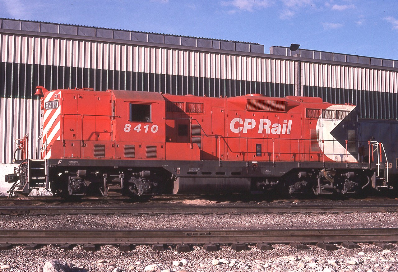 Nice view of GMD GP7 #8410 in the afternoon sun.  This unit became re-manufactured to GP7u #1510 by the early 1980s; and in 2011 it became the property of the Northern Plains Railroad as their GP9R 1510. I believe this locomotive may still be operational; hard to believe since it was built way back in 1952. I saw it back in 2016 at Fordville North Dakota still in tattered old CP red.