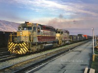 Canadian Pacific Railway GMD SD40s in the wine and grey script paint scheme. CPR 5552+5543 is leaving as a Westbound Extra at Kamloops British Columbia ????????, Shuswap Sub. on October 25, 1969.