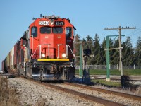 I cannot tell a lie, the GTW bug has bitten me. With 6224, 6420 and 5849 all floating around Southern Ontario, it makes it hard to really get a plan going. With virtually perfect weather yesterday and never having seen 568 run, the choice was fairly clear. After leaving home on a guess if they will run with 5849 and a few heads up from friends, fortune was with me. The Guelph sub is a rather scenic one, fairly easy chases, roads for the most part parallel all the way to Stratford making for an enjoyable outing. The layout at Argromart is a rather unique track plan, at least for this area and from what I have seen. The ring track following the perfect curvature of highway 27 makes for a rather pleasant sight of 568 shoving loads in and out. 