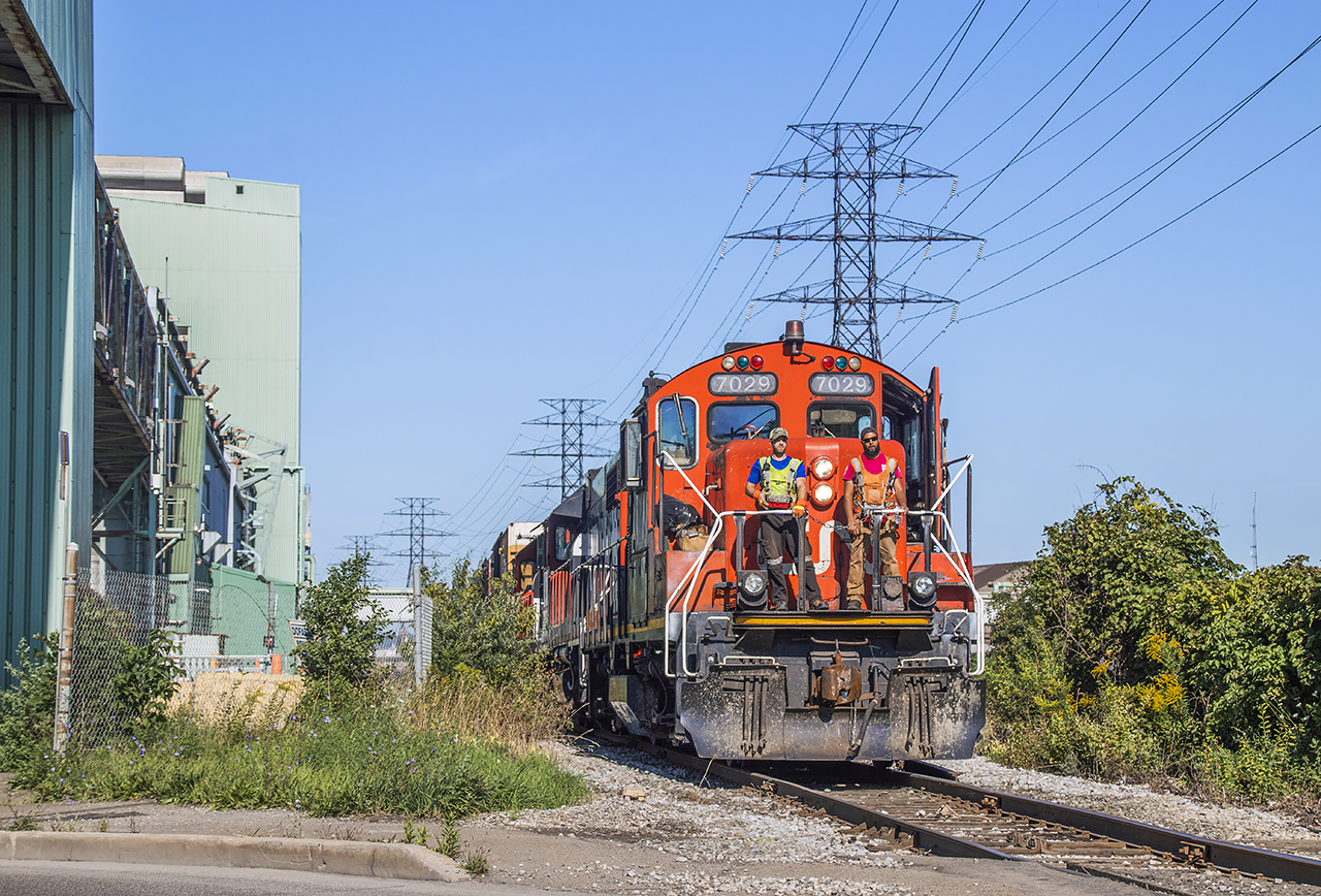 Deep in Hamilton's Industrial north end, CN's 0700 job proceeds east down the N&NW Spur.  Today's work will include switching out Parkdale Warehousing and a set off on the Irondale Lead for Railcare.
