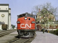 The Pas to Winnipeg passenger train stops at the Division Headquarters station at Dauphin. The Canadian Northern Built station is intact as of today and classified as a National Historic station