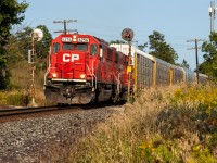 CP H19 is an interesting train. Because it runs westbound out of Oshawa around 5pm, it's almost always good light along the Belleville sub. The problem is a majority of H19s have been uninteresting power. For about 2 weeks in September, CP ran with EMDs and that's what we have here. A pair of Ex-SOO EMDs (CP 6256 and CP 4439) pull H19 through a very nice pair of searchlight signals on the Belleville sub in Ajax's north end. 