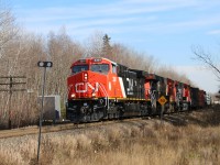 Newly rebuilt AC44C6M, 3301 leads train 305 out of Moncton's Gordon Yard along with ES44AC 3806 and AC44C6M 3300 all on the head end. 