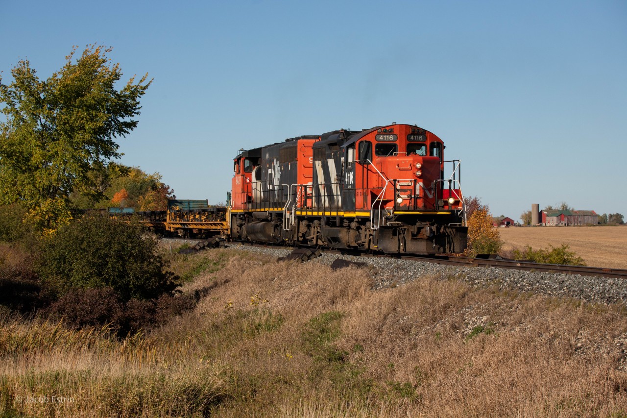CN L584 is lead by a classic GP9 in beautiful afternoon light as it heads South on the Talbot Spur.