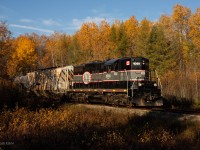 CCGX 1001 putters along the Meaford Sub with a small cut of cars for two different industries in Barrie.