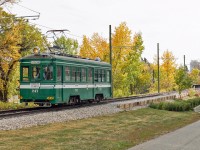 Hankai Electric Railway (Osaka) No. 247 was built in 1921 by Umebachi/Sharyo. It remained in service in Osaka until 1990, when it was acquired by the Edmonton Radial Railway Society. It saw first service in 1995 with the help of a generator trailer and finally made the first trip across the High Level Bridge under overhead lines in 1997.  Seen here on Thanksgiving weekend, the final weekend of operations for the 2022 season, it has just cleared the High Level Bridge northbound on it's way to the Jasper Avenue terminus.