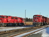 CP's Scotford Yard is home to several ex SOO SD60s. Here CP 6258 paired with GP38-2 CP 3054 are moving cars around the yard while CP 6262 and CP 6265 sit on the shop track.