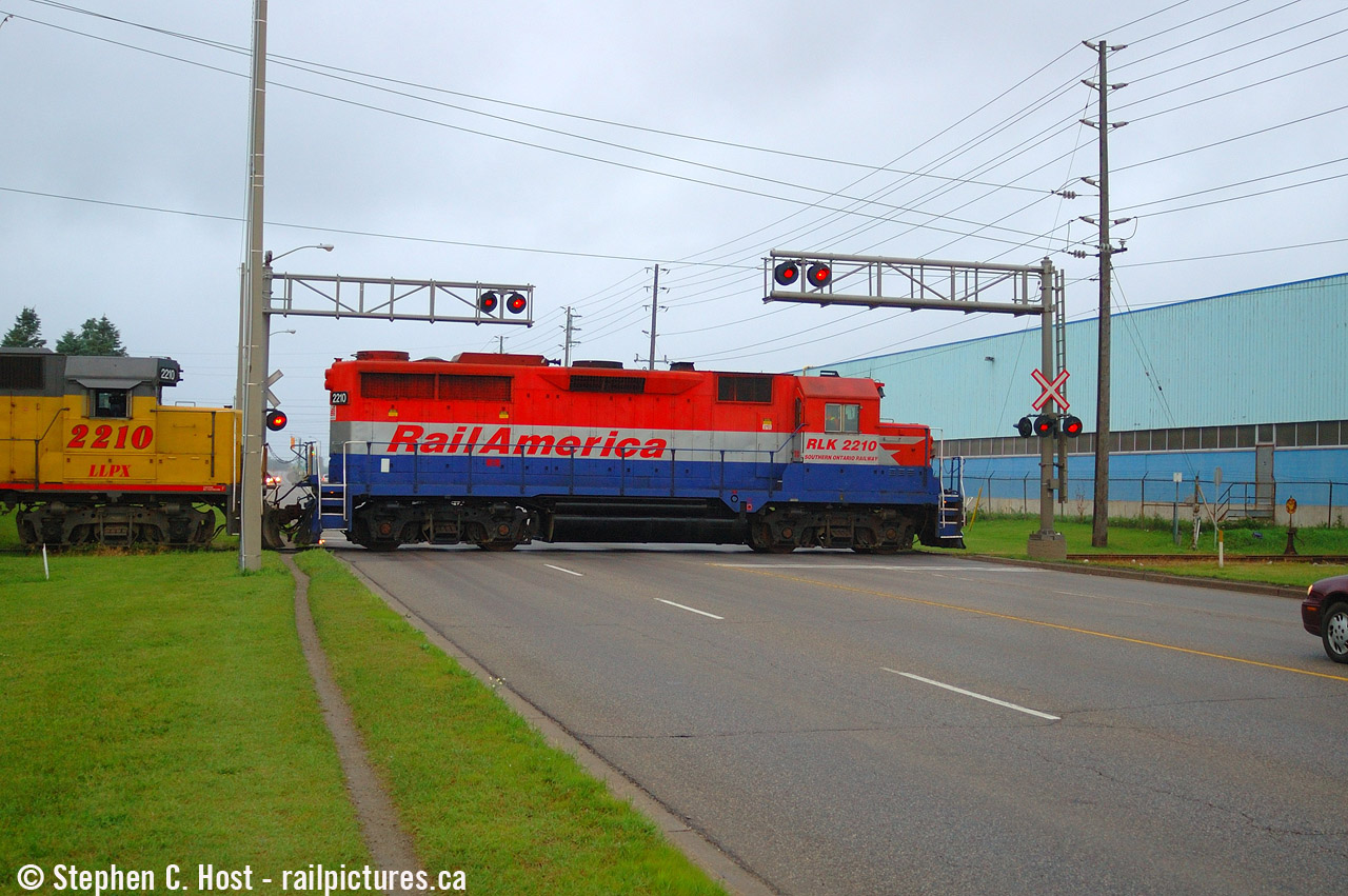 For a brief few months after RLK 2210 arrived, there were two locomotives on GEXR with the number 2210. I ended up following this train in Cambridge and photographed them as they switched Access Warehousing. Access stopped using rail well over 10 years ago I think and the tracks in the street are now removed as is the crossing protection. The easement remains though in case someone wants to spend a million bucks to bring rail service to their factory..