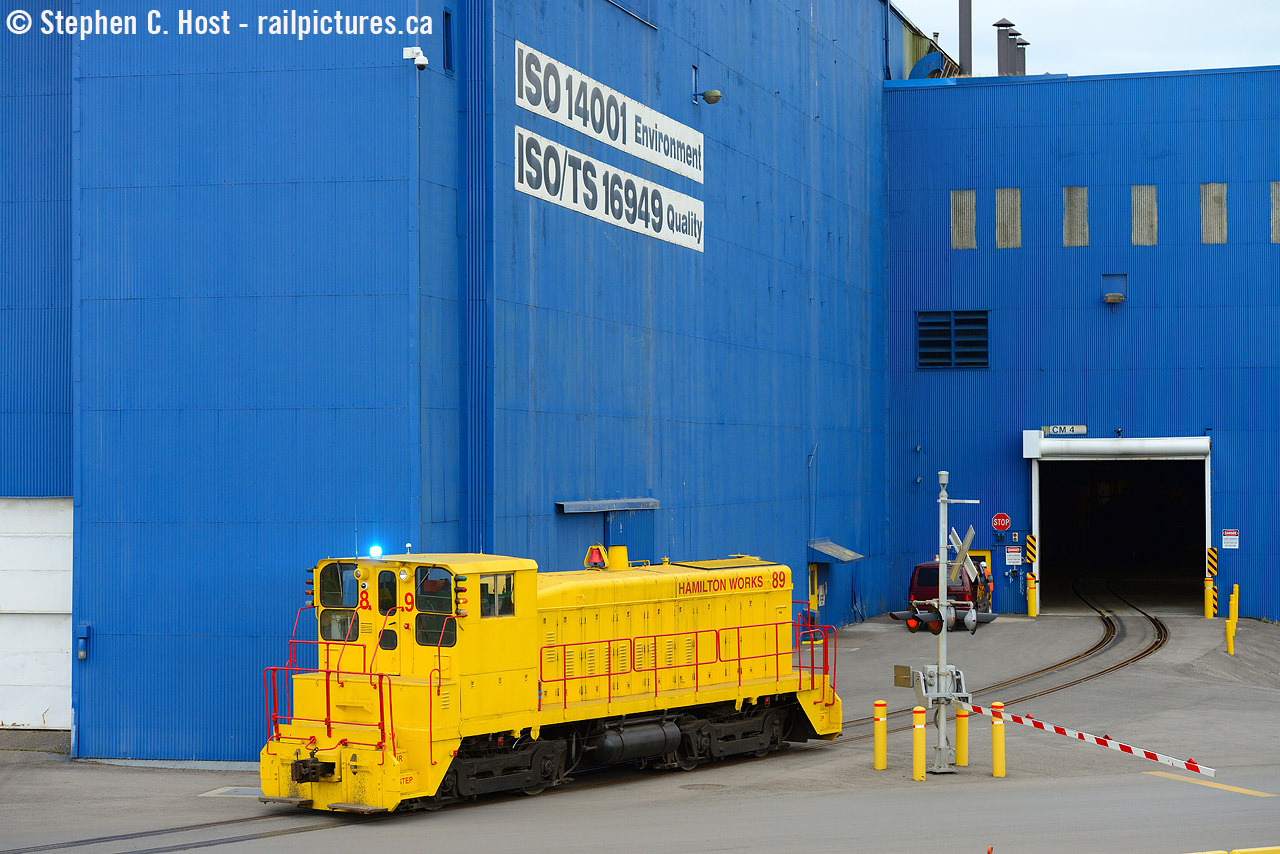 Sometimes you find something in your old shots that surprises you, pictured the strobe light is captured at full brightness as the Stelco beltpack crew is reversing into the "Z" Line to lift a cut of loaded coils in 2014. Unfortunately, Stelco has sold 89, 84 and removed/scrapped any other locomotives that were once on site, and now it's just Stelco trackmobiles now.