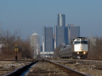 VIA 72 is underway out of Windsor with a F40 wrap leading the way. What would become VIA 76 later that afternoon can be seen in the distance also sporting a wrapped F40 leader. 
