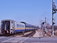  <br>
<br>
   VIA #62  Rapido with FP9A #6533 accelerates away.... with a new LRC car on the tail end.
<br>
<br>
 At CN Guildwood mile 321 Kingston Sub, May 13, 1983 Kodachrome by S.Danko
 <br>
<br>
   Noteworthy: 
 <br>
<br>
   that LRC car appears to have some external damage above the windows...and the door step is wired up. 
 <br>
<br>
   more:
 <br>
<br>
     <a href="http://www.railpictures.ca/?attachment_id=  50537">  head end  </a>
 <br>
<br>
sdfourty



