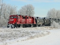 In a "winter wonderland" of frost GP20C-ECO 2233 and GP38-2 3111 lead CP's B27 local Red Deer to Rimby (fhe Homeglen turn) west on the Hoadley Subdivision.