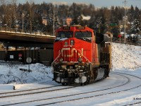 CN 2910 pushes on a coal train as it ducks under Brunette Ave. in New Westminster (Vancouver), BC. The leader was CN 3948. Vancouver area was hit with a relatively large snowfall for the area and I was able to catch some train action in the aftermath. Merry Christmas to all RP.ca contributors.