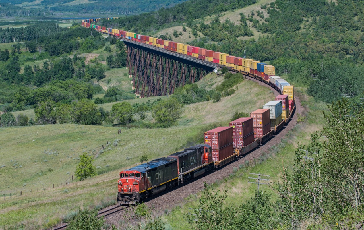 CN 2436 led Q186 through Uno in the summer of 2021, with this being the beginning of the end for some of these units I spent as much time as I could documenting them, including hiking through the valley and up the hill for this shot.