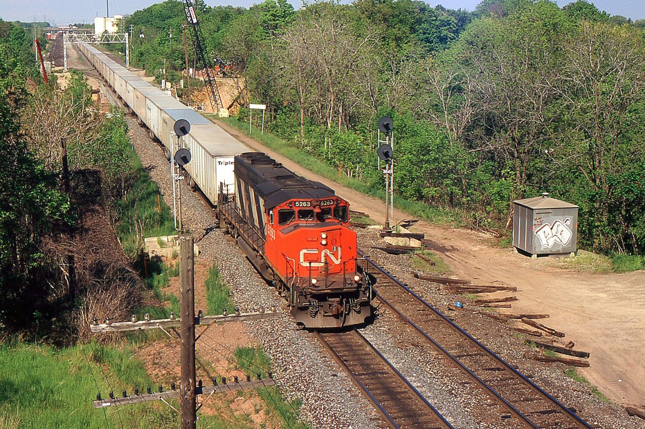 CN 145 with CN SD40-2W 5263 at Aldershot West on the CN Oakville Sub as Construction begins for the third track between Burlington to Bayview.