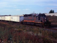 CN 145 with GCFX SD40-3 6075 at Tansley on the CN Halton Sub on Oct 3/2006