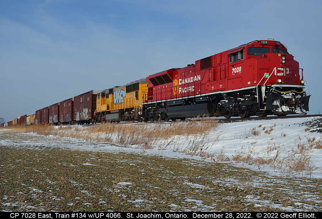 As the snow melts with rising temperatures CP Train #134 heads eastbound on the CP Windsor Sub on December 28, 2022.  The CP 7028 and UP 4066 pair came west on train #135 the day before when they were plagued by issues.  From losing the UP unit and having to double the hill at Campbellville, to computer issues on 7028 in London, the train finally made it to Windsor around 11:00pm on the 27th resulting in this early morning eastbound run.  Not sure they had the power issues resolved, but at least the horn on 7028 worked today!! All tolled train #134 had 544 axles at the detector, so I'm hoping they had a better eastbound run than they did heading west the day before....