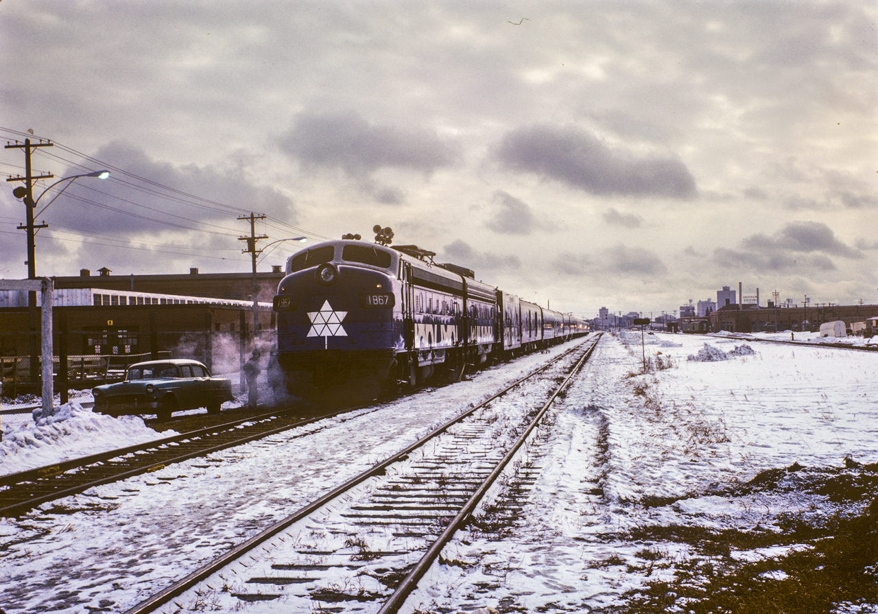 The Confederation train ran across Canada in 1967 to celebtate 100 years of Canada. MY grandfather took this photo at the Edmonton Exhibition grounds while the train was on display in late February 1967. The GPS location is approximate, based on where I think it was. It's a faded slide, with digital restoration.